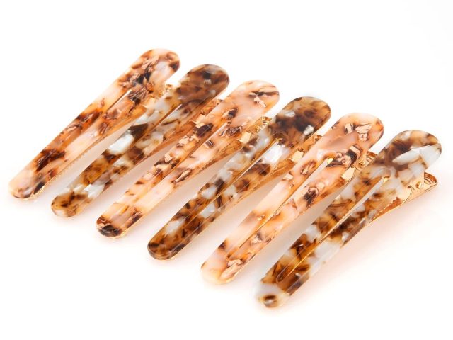 Travel-Friendly Hairstyles: Why Duckbill Hair Clips Belong in Your Bag